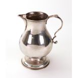 A George II silver pear shape cream jug, London 1754, makers mark unclear,