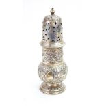 An Edwardian silver sugar caster, Wakely & Wheeler, London 1901, in late 17th century style,