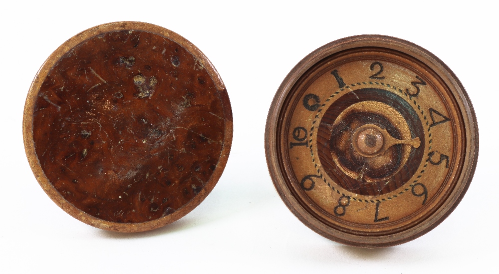 A late 19th century circular wooden cased shooting marker,