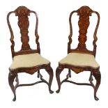 A pair of Dutch walnut floral, bird and figural marquetry dining chairs, 18th century,