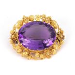 An early Victorian gold and amethyst brooch,