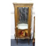A reproduction Louis XV Vernis Martin style giltwood vitrine, of shaped outline, gilt metal mounted,