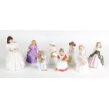 A collection of Eight Royal Doulton porcelain figures, Birthday Girl, HN 3423, Penny HN 2338,