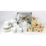 A Shelley white glazed tea service, with lobed sides and fluting, twenty three pieces,