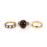 A gold, half-pearl and amethyst ring, 4g gross, a cabochon garnet ring set in yellow metal, 5.