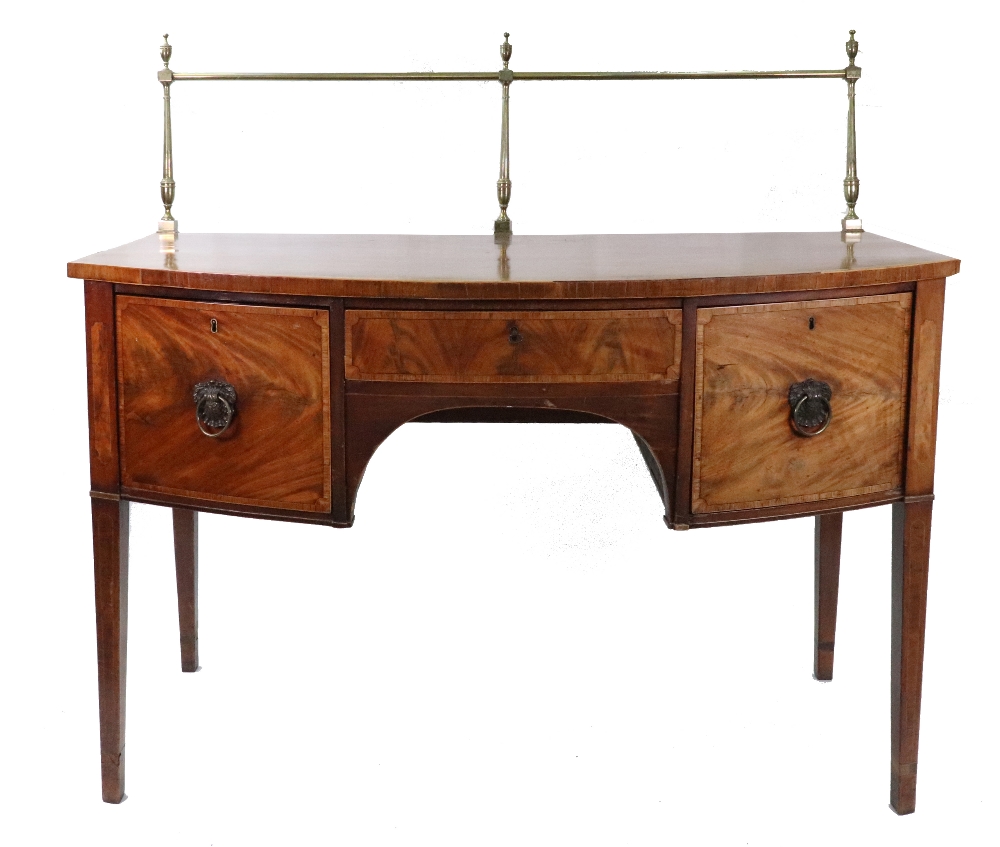 A George III mahogany tulipwood crossbanded boxwood and ebony strung bow fronted sideboard,