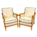 A pair of Biedermeyer style birchwood armchairs, Swedish, circa 1930, with scroll arms,