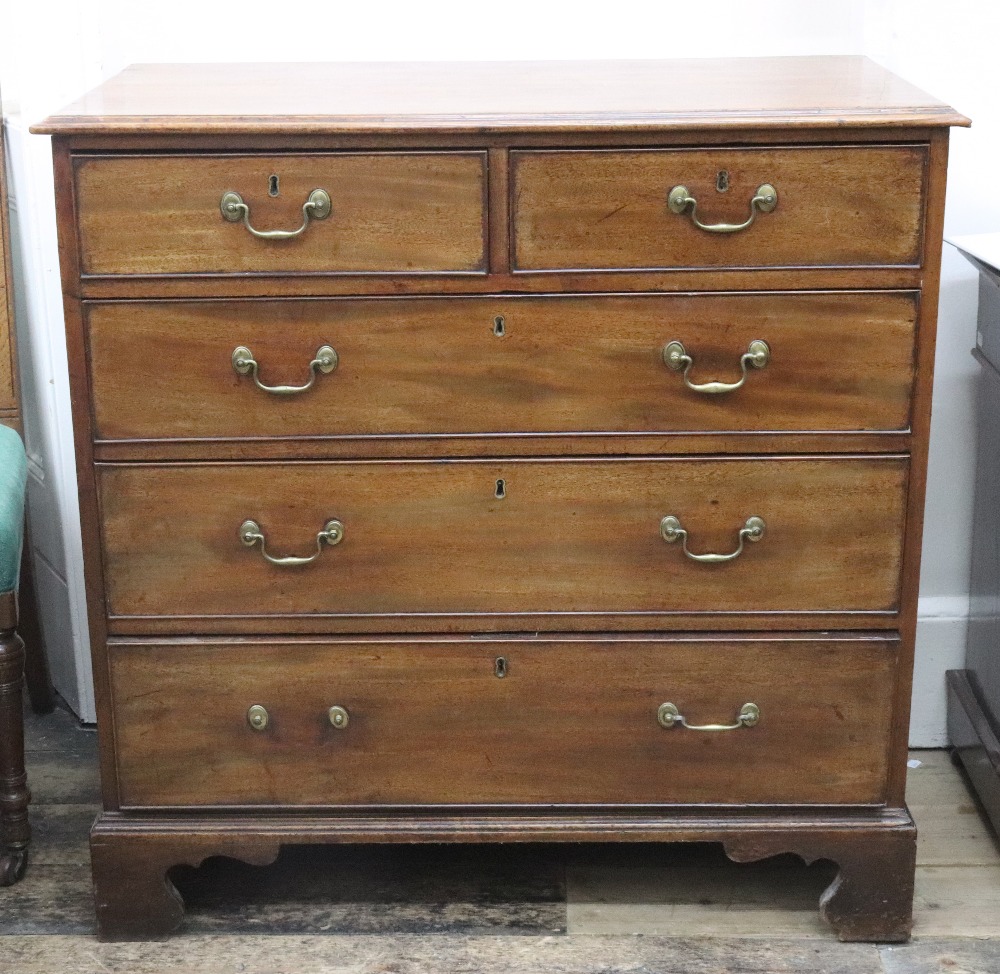 A George III mahogany chest, the moulded rectangular top above two short and three long drawers,