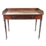 A Regency mahogany tray top dressing table, with two frieze drawers, on ring turned legs,