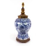 A Dutch Delft blue and white vase, circa 1700, of octagonal baluster form,
