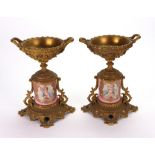 A pair of French gilt metal porcelain mounted vases, circa 1870, of classical two-handled form,