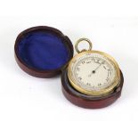 A gilt metal drum cased pocket barometer, with silvered dial, 4.