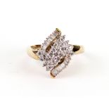 A modern marquise shaped cluster ring,