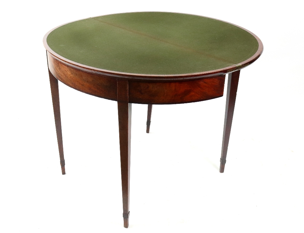 A George III mahogany tea table, with hinged demi lune fold over top, on square tapered legs, - Image 2 of 2