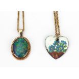 An opal doublet pendant in 9ct gold frame, Birmingham 1973, on 9ct gold chain,