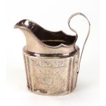 A George III Irish silver helmet milk jug, Dublin 1798, bright cut engraved, 11cm high, 4ozs,