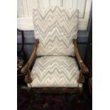 A reproduction Charles II style walnut frame armchair,