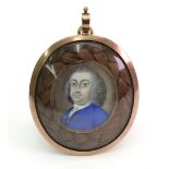 English School, mid 18th Century, A portrait miniature of a gentleman in a blue coat,