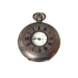 A white metal cased keyless wind half hunter pocket watch,