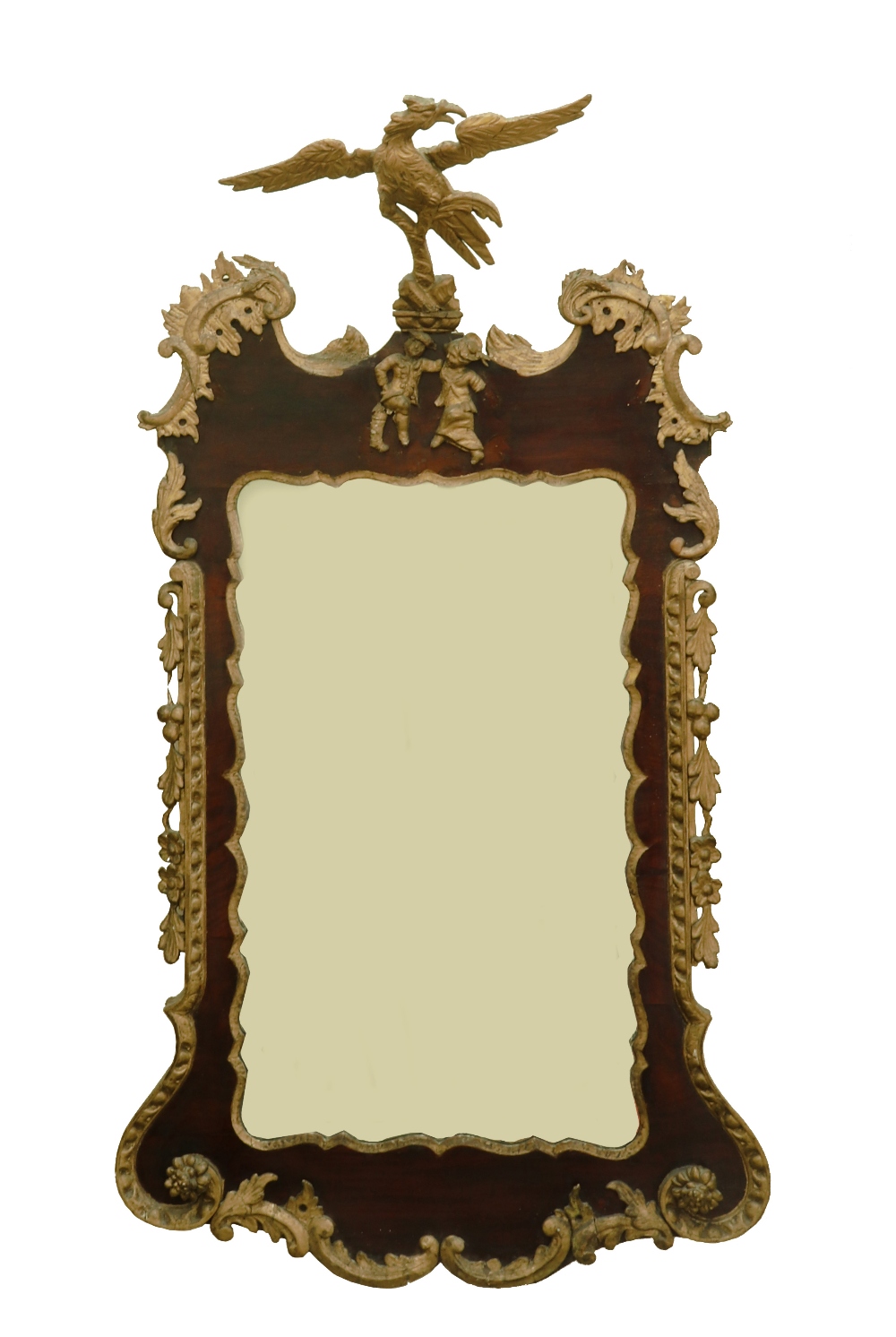 A George II and later red walnut and parcel gilt upright wall mirror, of shaped outline,