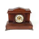 Ansonia Clock Co: an American oak cased mantel clock, late 19th century,