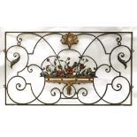 A pair of Italian wrought iron and polychrome decorated rectangular panels, early 20th century,
