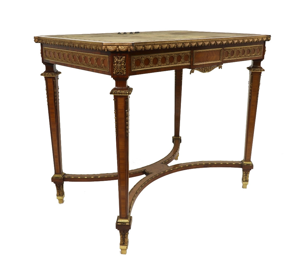 A Louis XVI style ormolu mounted kingwood crossbanded and boxwood strung centre table, circa 1900,