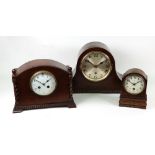 Two oak cased mantel clocks, first half 20th century, one chiming,