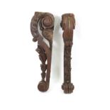 A pair of 17th style oak legs or brackets, second half 19th century, carved with leaf scrolls,
