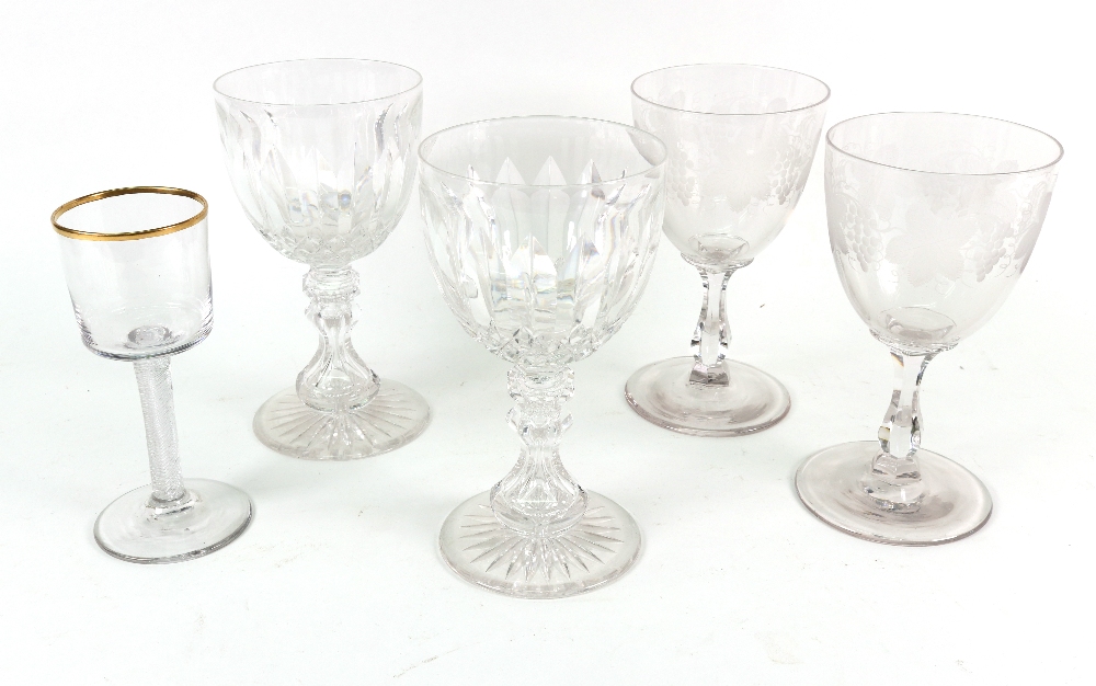 A pair of Victorian style facet, split and diamond cut glass goblets, on star cut bass, 19cm high,