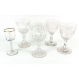A pair of Victorian style facet, split and diamond cut glass goblets, on star cut bass, 19cm high,