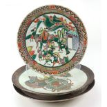 A Chinese famille-verte Dish, late 19th century, painted with warriors in a procession,