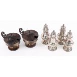 A set of four George II style silver vase shape pepperettes, William Hutton & Sons, Sheffield 1910,