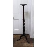 A George III style carved mahogany torchere, early 20th century,