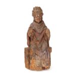 A carved polychrome decorated figure of a Bishop, 17th/18th century, 56cm high. Illustrated.