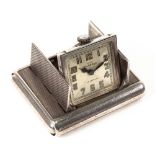 Tavannes La Captive - an Art Deco silver cased folding watch/timepiece,