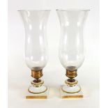 A pair of modern Portuguese white and gilt porcelain candle holders,