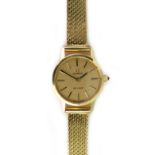 Omega; a lady's 18ct yellow gold Omega De Ville bracelet wristwatch, with mechanical movement,