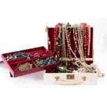A small collection of costume jewellery, in a 1950's jewellery box.