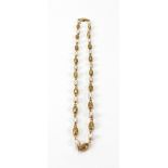 A yellow metal and freshwater pearl necklace,