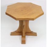 A Robert 'Mouseman' Thompson golden oak octagonal coffee table, circa 1930, on quadripartite base,