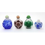 Four Chinese overlay glass snuff bottles, late 19th/20th century, comprising,