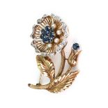 A 9ct gold, sapphire, diamond and cultured pearl brooch in the form of a stylised flower,