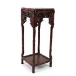 A Chinese rosewood miniature square two tier vase stand, late 19th/early 20th century,
