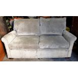 Multiyork: A two seat bed settee, with loose back and seat cushions, upholstered in velour,