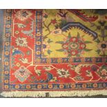 A modern carpet of Sultanabad design, the mustard field with all over palmettes and leaves,