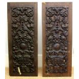 A pair of 17th style oak panels, second half 19th century, carved with masks,