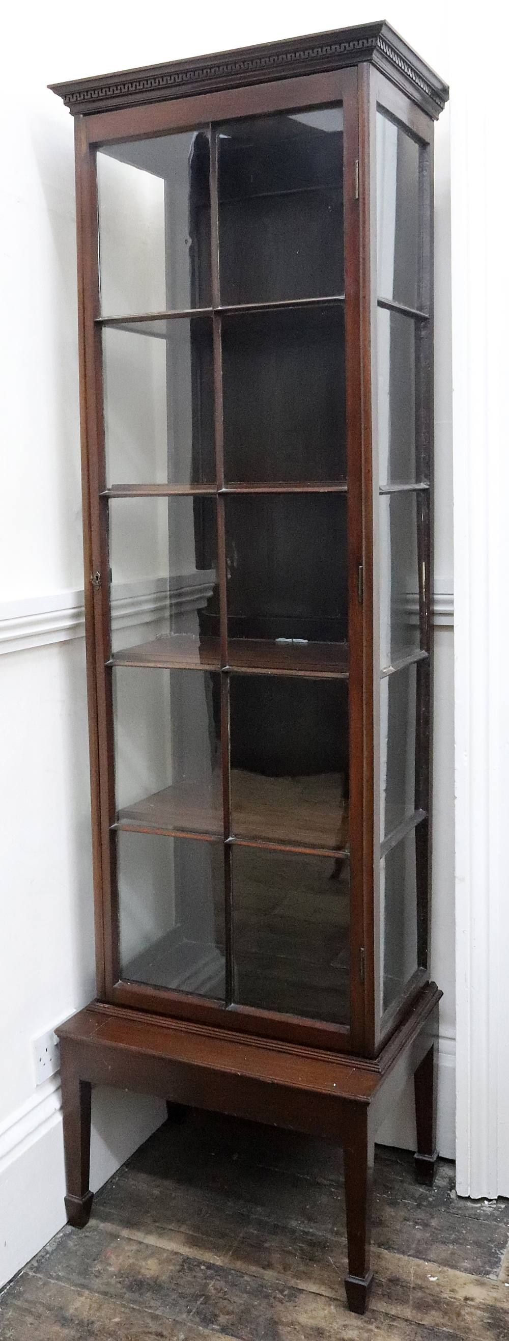 A George III style mahogany display cabinet, 19th century and later,