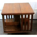 An Edwardian mahogany satinwood crossbanded boxwood and ebony strung table top revolving bookcase,