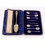 A cased set of six silver coffee spoons and sugar tongs, Roberts & Belk, Sheffield 1911,